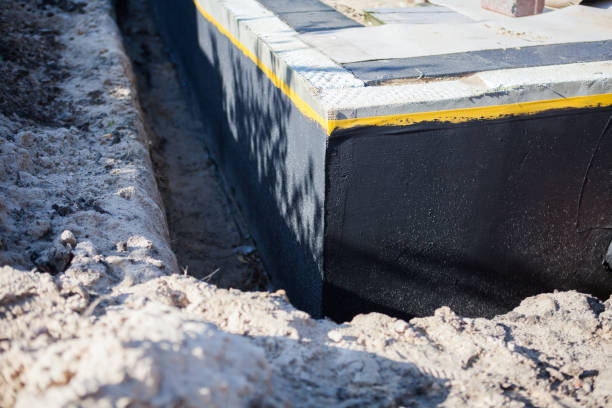 Professional Waterproofing technician working in Appleton, MN